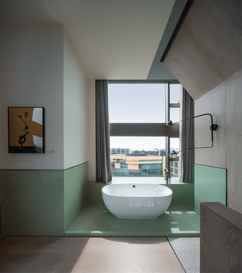 與書屋融合的亞朵 S 酒店裝修設(shè)計(jì)案例(圖10) 與書屋融合的亞朵 S 酒店裝修設(shè)計(jì)案例(圖10)